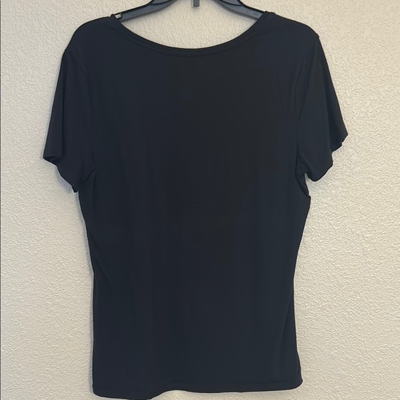 Women large Amazon tops in white and black. One top has a wider neckline. - Picture 5 of 14